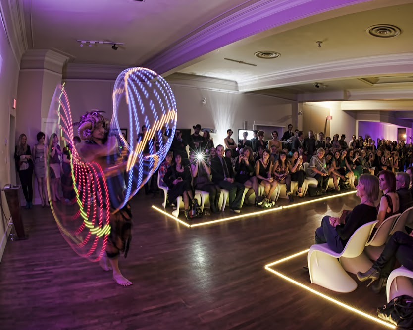 Designer Kyle Nylund's "Grandstand" features performer Geoffrey Szuszkiewicz in a two-hoop performance. Photo: Jeff McDonald Photography